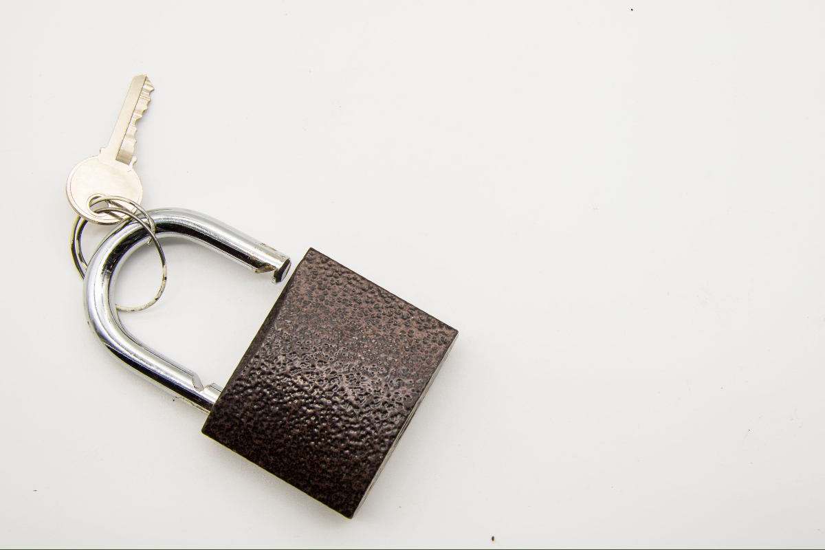 Metal Padlock - Locksmithing Concept.
